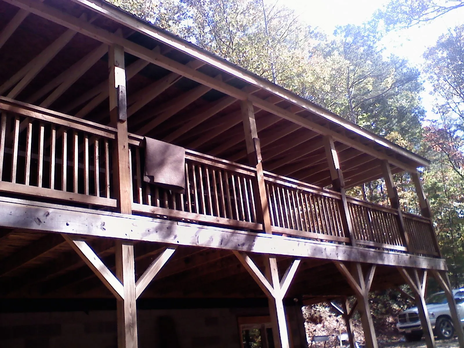 Timber framing under a new elevated porch and deck — Roof Leak Repair in Pinehurst by Roofing Brothers